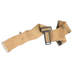  World War II childs gas mask in original box, together with another gas mask and ammunition shell