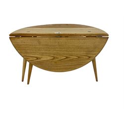 Ercol - elm and beech '308 Folding Occasional Table', circular top with gate-leg and splayed tapering supports