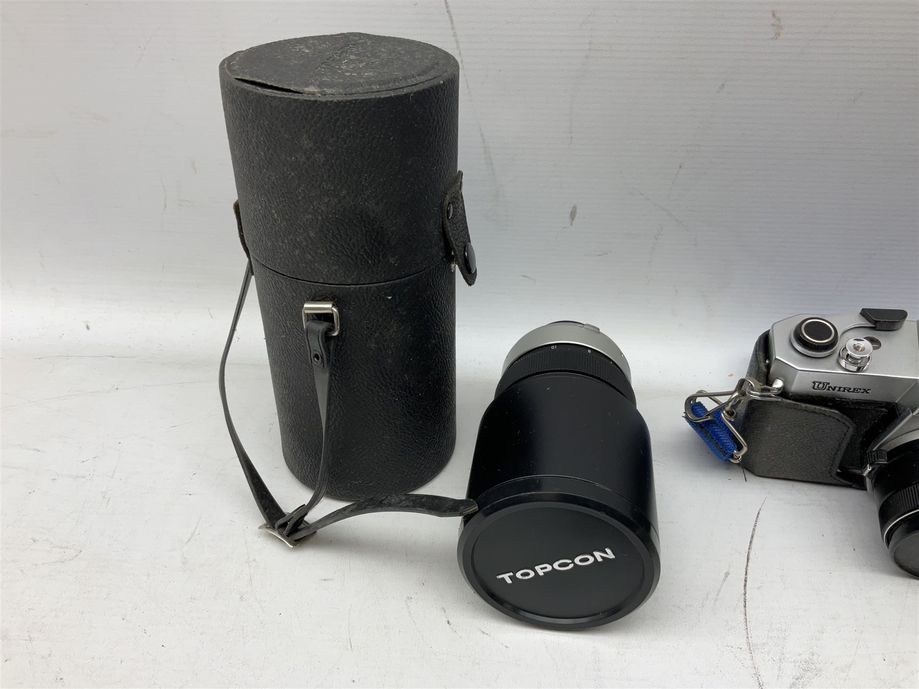 Quantity of cameras and lenses to include Topcon Unirex camera etc with cases