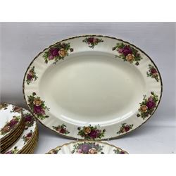 Royal Albert Old Country Roses pattern coffee set for four, comprising coffee pot, milk jug, cups and saucers, cake plate, together with six dinner plates, side plates etc (34) 