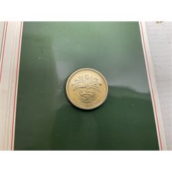 Two Great Britain and Northern Island proof sets dated 1970 and 1971, both with card cases, three 1986 Commonwealth Games commemorative two pound coins, in card folders, and six brilliant uncirculated one pound coins, in card folders