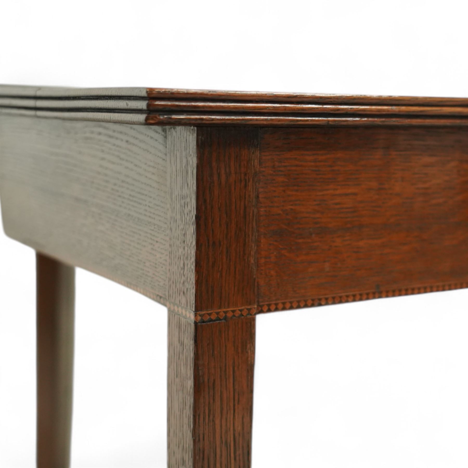 Early 20th century oak side table, rectangular top over single frieze drawer with brass ring handle, raised on square tapering supports