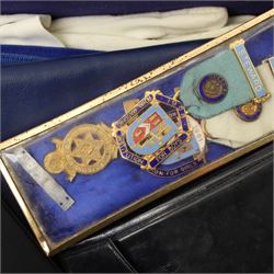  Masonic Regalia including silver gilt and enamel Past Masters jewel from the Hazel Lodge, other gilt metal jewels, leather aprons etc in case