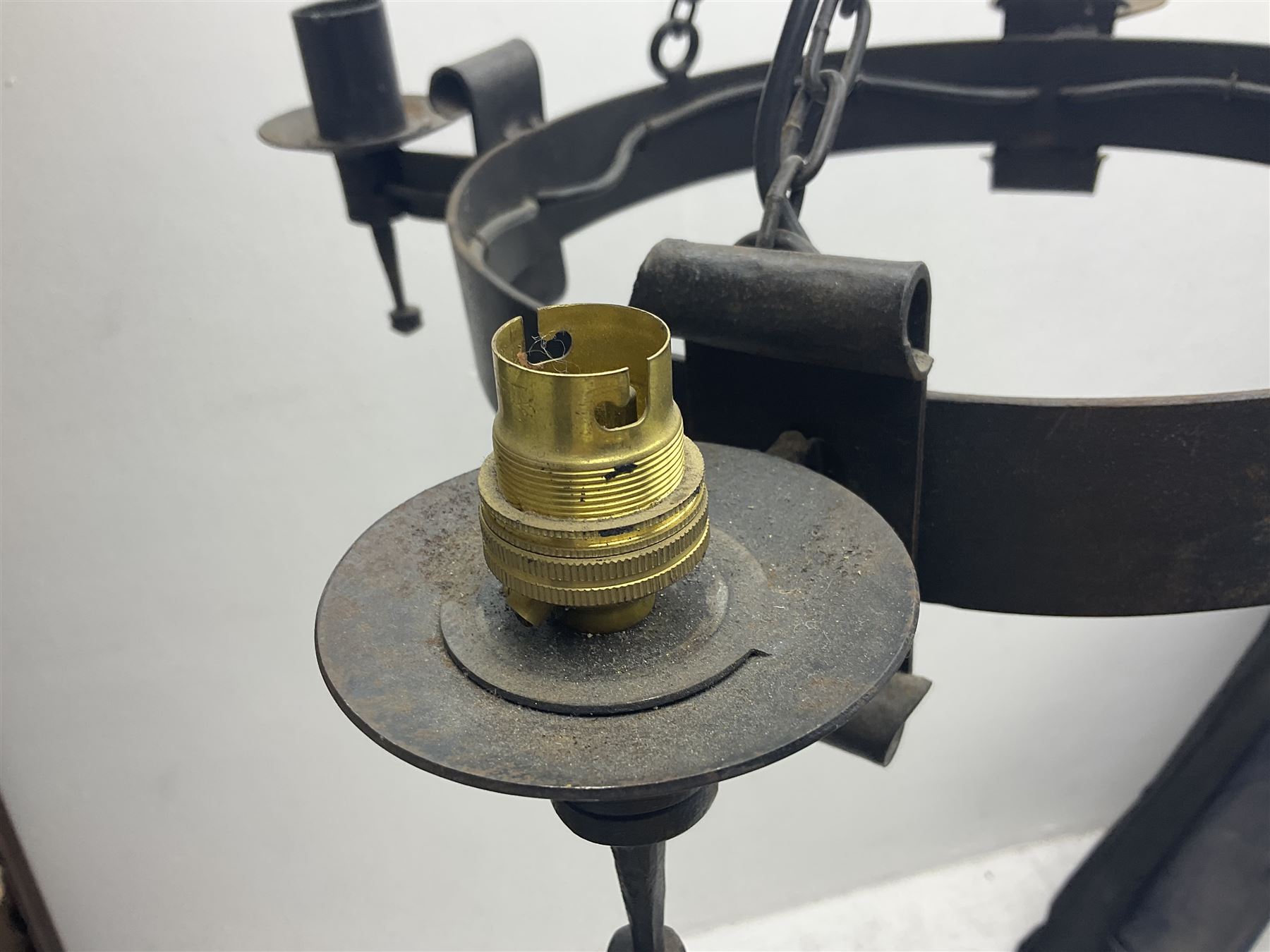 Pair of gothic style wrought iron ceiling lights, each with four branches, D58cm