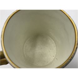 Sèvres soft paste porcelain coffee can and saucer with date code for 1754, painted and gilded with flowers, dangling from the shaped green border, interlaced LL monogram enclosing the date letter A above painters mark for Dodin, coffee can H7cm, saucer D14.5cm