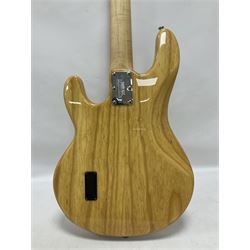 Ernie Ball Music Man Sting Ray 4 string bass guitar, in natural finish with roasted maple neck and tortoiseshell effect scratch guard, serial no 87485, in black Music Man hard case, guitar L114cm