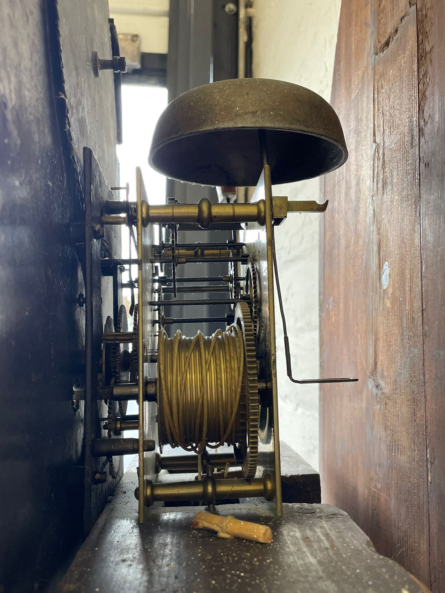 John Bancroft of Scarborough - a fine late George III 8-day mahogany longcase clock, with an elaborate pagoda pediment, brass ball and eagle finials and oval conch shell inlay, break arch hood door flanked by reeded pilasters with brass Corinthian capitals, trunk with inlaid canted corners and a break arch trunk door with 
