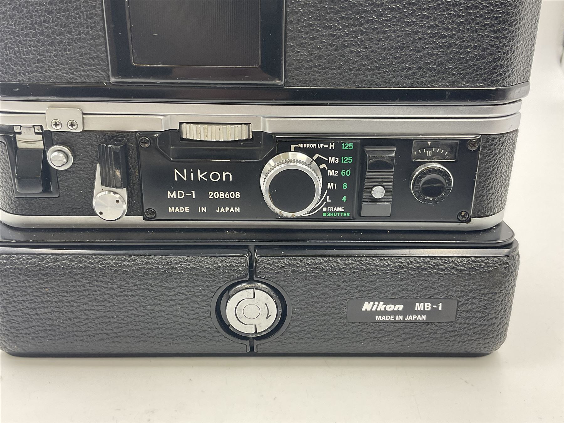 Nikon F2A Photomic camera body, serial no. 7844439, with 'Nikon Zoom-NIKKOR 35-70mm 1:3.5-4.8' lens, serial no. 5352031, Nikon MD1 Motor Drive, serial no. 208608 and Nikon MB1 battery pack