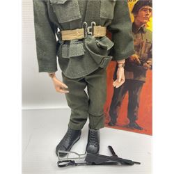 Palitoy Action Man Action Soldier No.34014 with tunic, belt, trousers, boots, blue beret and sten gun; in original box; and Palitoy Action Man Royal Military Policeman (RMP) gripping hands figure, marked 'Made in England by Palitoy under licence from Hasbro © 1964' to rear of torso; with tunic, shirt, trousers, tie, boots, belt, truncheon, pistol in holster, MP armband, red cap, Sterling machine gun and other clothing etc; in anrelated display box (2)