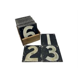Collection of approximately fifty five cricket score cards, each black metal card painted in white with a singular number, H15cm W15cm