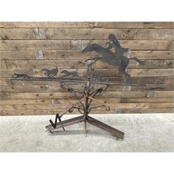Black painted wrought iron weather-vane depicting hunting scene and compass points