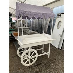 White painted display stand in the form of a cart  - THIS LOT IS TO BE COLLECTED BY APPOINTMENT FROM DUGGLEBY STORAGE, GREAT HILL, EASTFIELD, SCARBOROUGH, YO11 3TX