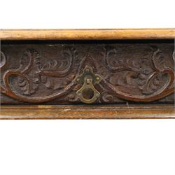 18th century oak lowboy, rectangular top with moulded edge, fitted with single frieze drawer carved with scrolling fruiting vines and stylised plant motifs, raised on bobbin-turned supports united by box stretcher 