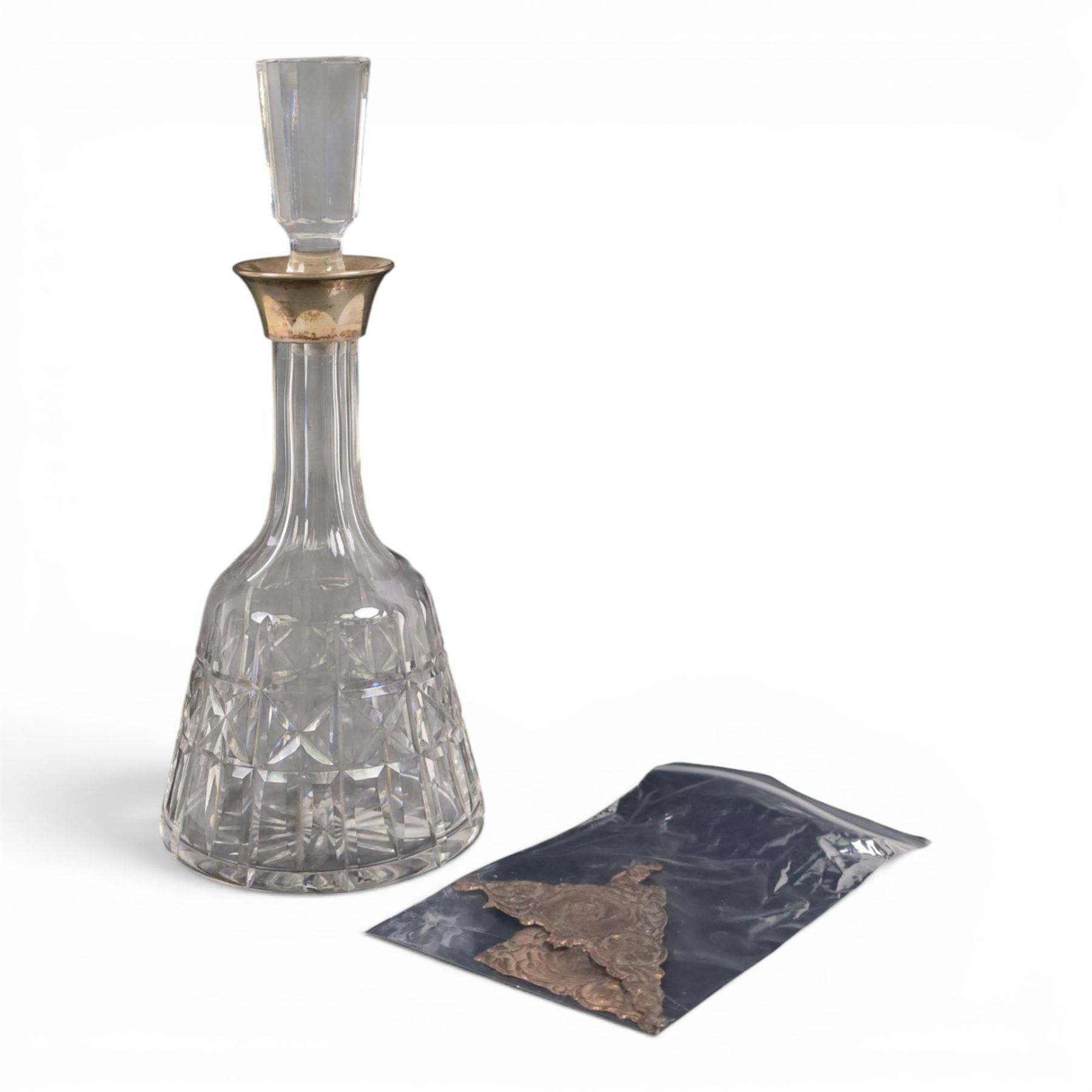 Silver collared glass decanter, with etched personalisation to body, together with two silver repousse corner panels