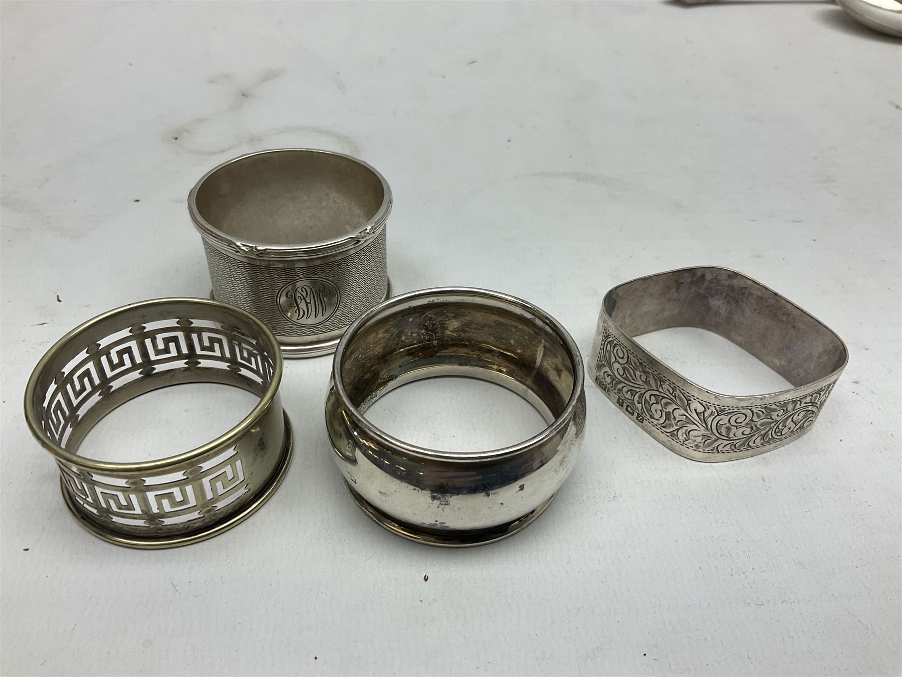 Group of silver to include cased set of six silver handled knives hallmarked Birmingham 1921 by Raeno Silver Plate Co, three hallmarked napkin rings etc together with silver plated and other metalware etc