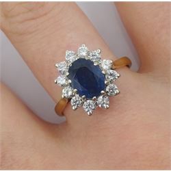 18ct gold oval sapphire and diamond cluster ring, hallmarked, sapphire approx 1.00 carat