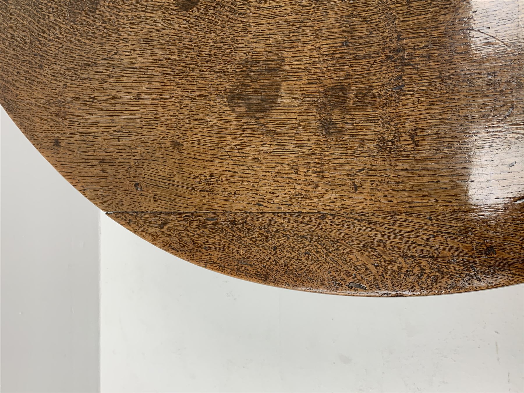 Late 17th century William & Mary oak drop leaf dining table, oval drop leaf top, single drawer to one end, gate action base, turned supports joined by bobbin turned stretchers, 121cm x 135cm, H75cm (open)