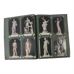 French cased metronome together with Noma Santa-Glo and a collection of museum postcards of nude sculpture 