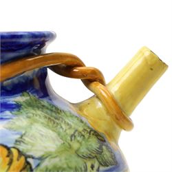 Italian maiolica wet drug jar inscribed 'Ol Mastica' 20th century, painted with putto, church buildings etc H22cm