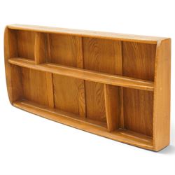 Ercol - elm plate rack, rectangular form with rounded corners, fitted with two open shelves divided by staggered upright partitions, fixings for hanging