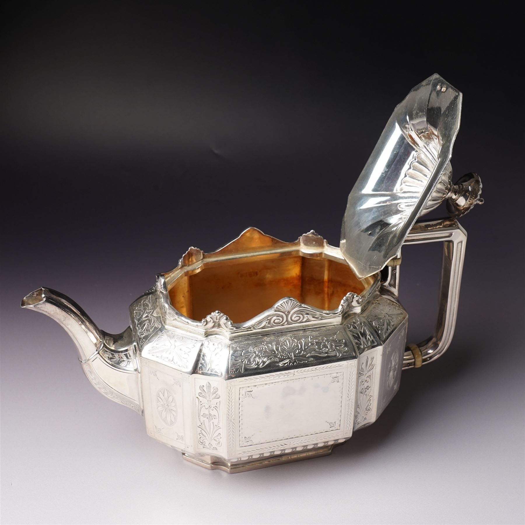 Victorian silver tea and coffee set engraved with classical urns, oval paterae and scrolling foliage, monogram and 'Diligentia et Honore' comprising teapot, tea kettle on spirit heater stand, coffee pot, two handled sugar bowl and cream jug Sheffield 1891 Maker John Round & Son Ltd