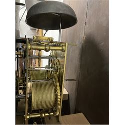 George Clapham of Brigg - Late 18th century 8-day oak cased longcase clock c1790 - flat topped hood with later carved addition, dog tooth moulding and blind fretwork beneath, break arch hood door flanked by reeded pilasters and capitals, trunk with canted corners and  door with a triple arched top, plinth with a later base with decoratively shaped feet, early painted dial with flowers enclosed in a gesso border to the spandrels, rolling moon to the arch, seconds dial and calendar aperture, Roman numerals and five minute Arabic's with makers name (indistinct), dial pinned via a false plate to a rack striking movement. With weights, key and pendulum.