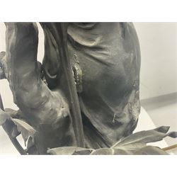 Pair of Art Nouveau style spelter figural table lamps, each mounted on rouge marble effect circular bases, with toleware flower heads and leafy decoration surrounding a female figure, H90cm