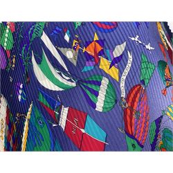Hermès 'Les Folies Du Ciel' plisse silk scarf, designed by Loïc Dubigeon, printed with hot air balloon motifs, contained within twisted green rope border, on merging light and navy blue ground, with rolled hand stitched edges and Hermes material label, length 129cm