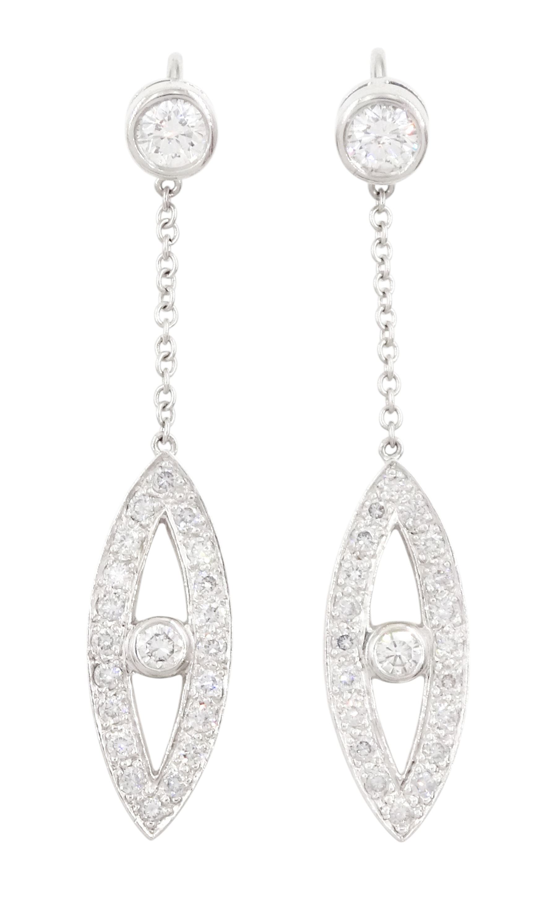 Pair of 18ct white gold round brilliant cut diamond pendant earrings, marquise shaped diamond drops, with central single stone diamond, suspending from trace link chain to a further single stone diamond, London 2009, total diamond weight approx 0.80 carat