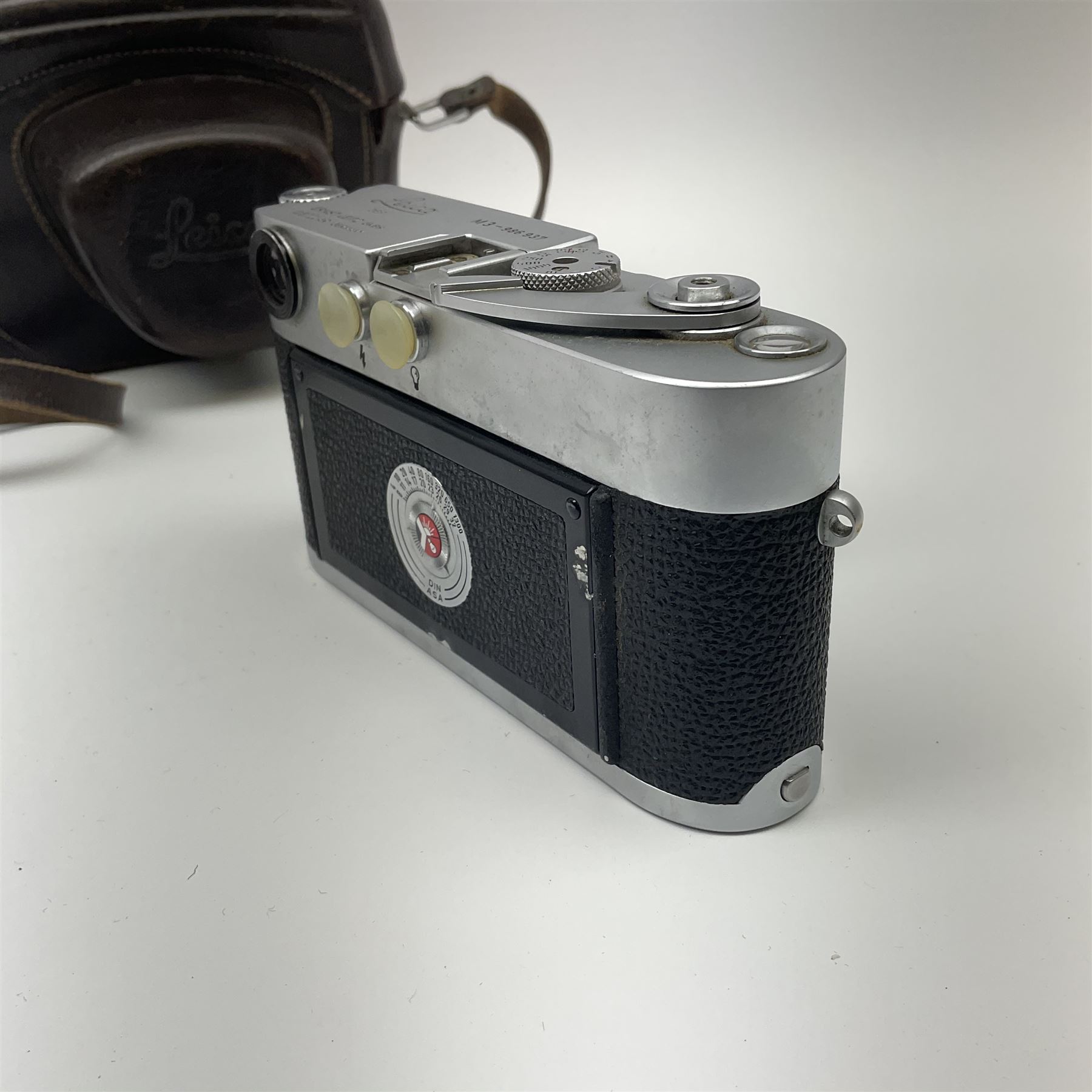 Leica M3 camera body, 1959, chrome finish, serial number '986937', fitted with 'Ernst Leitz GmbH Wetzlar Summicron f=5cm 1:2 Nr.1592614' lens, with Leica M3 instruction booklet