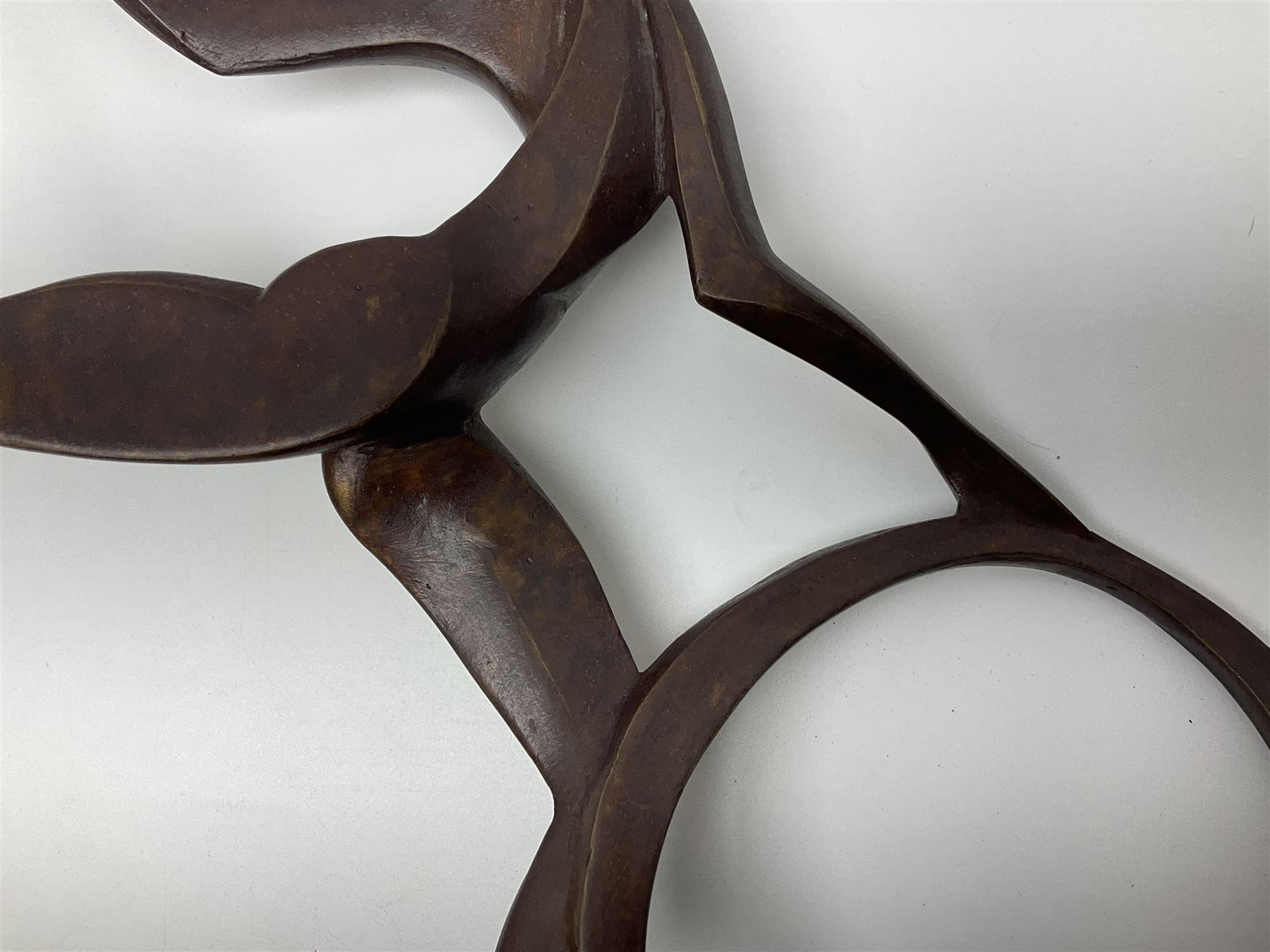 John Huggins FRBS (British 1938): 'Girl with Hoop', bronze sculpture upon black lacquered wooden base, H33cm, artist resale rights apply