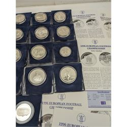 Twenty-two The Royal Mint silver medallions from the '1996 European Football Championship' collection, including 'Floodlights', 'First Match Germany vs England 1899', 'Gordon Banks', 'Stanley Matthews', 'Kevin Keegan', 'Sir Thomas Lipton', 'Wembley Stadium' etc, mostly with certificates