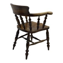 19th century elm and beech smoker's bow armchair, shaped arms over turned spindle gallery and dished seat, on turned supports united by double H-shaped swell turned stretchers 