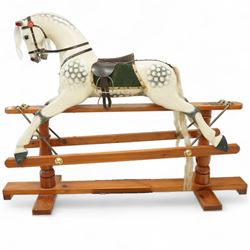 Antony Shackleton of Snainton - 1997 rocking horse titled ‘Fred’, the painted dapple grey body with real horsehair mane and tail, green velvet saddle cloth and leather tack, mounted on a pine swing stand with brass fittings