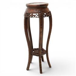 Chinese hardwood jardiniere stand, with inset black veined white marble, pierced carved apron united by rose carved undertier