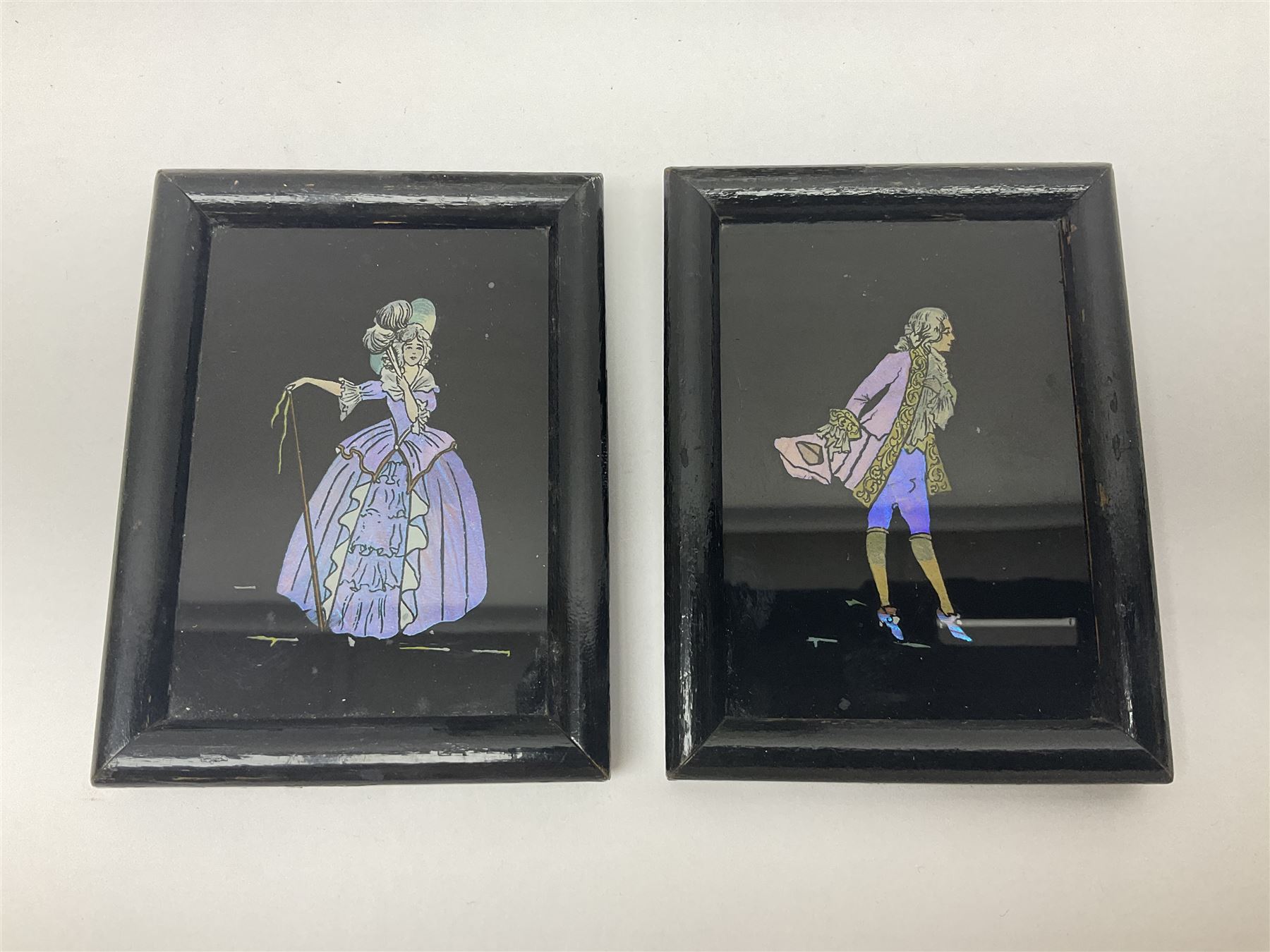 Seven 1930's butterfly wing pictures, mainly of ladies in period dress, one signed Dorothy Buckley, largest H18cm