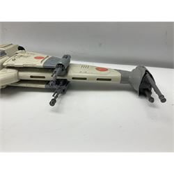 Star Wars - three space vehicles comprising B-Wing fighter and large Millenium Falcon space ship; both with instructions; and Boba Fett Slave 1; all unboxed (3)