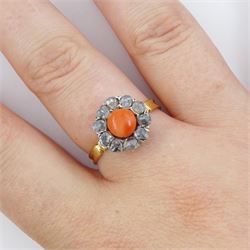 Early 20th century 18ct gold and silver coral and diamond cluster ring, single  cabochon cut coral, surrounded by ten rose cut diamond stones 