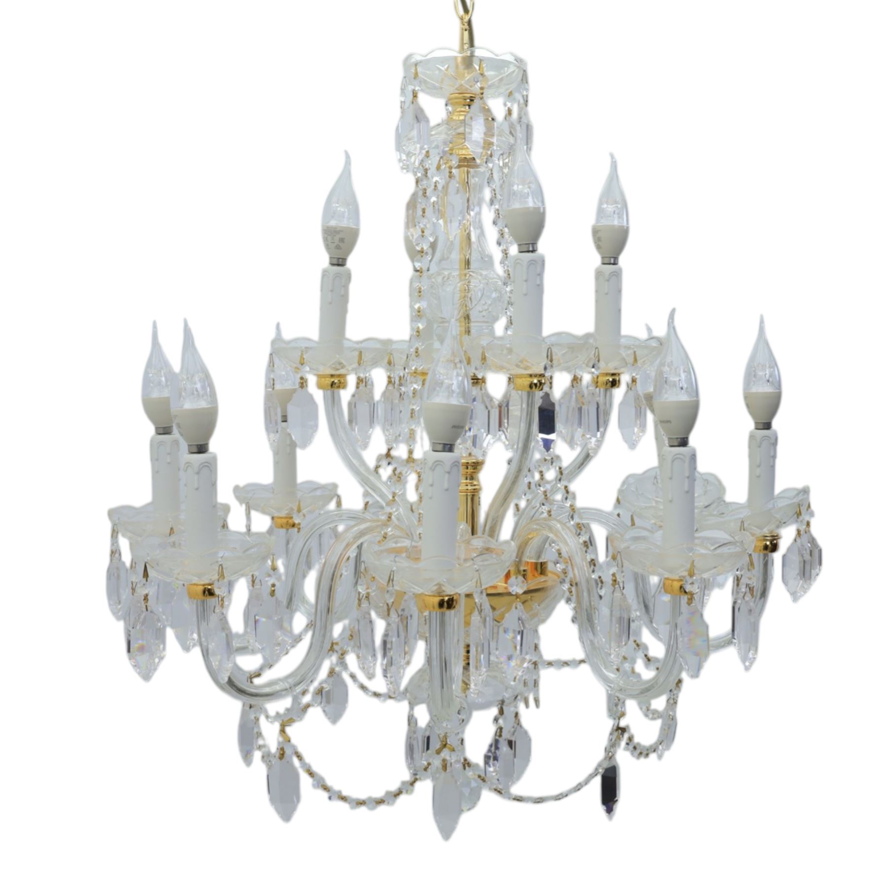 Late 20th century gilt brass and glass twelve branch chandelier, with glass swags and drops