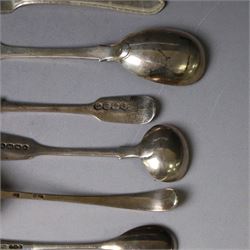George III silver marrow scoop, hallmarked London 1767, makers mark indistinct, together with a collection of silver condiment spoons and butter knives, all hallmarked