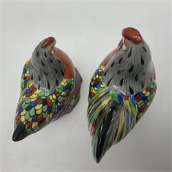 Pair of early 20th century Chinese export porcelain figures, modelled as a cockerel and hen, each with hand painted polychrome plumage, with gilt beaks and detailing, upon a rockwork base, tallest H17cm