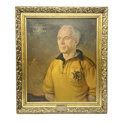 Roland F. Spencer Ford (1902 - 1990), oil painting on canvas, half length portrait of Raich Carter, standing dressed in Hull City kit, the Hull town crest in the background surrounded by the names Hull City A.F.C., Sunderland, Derby County and England, bears label verso from the studio of the artist in Newstead Street, Hull with original price of £75, signed, 59.5 x 49.5cm, gilt frame with metal plaque inscribed ' Presented by the Management Committee/of the Hull City Supporters Clubs/as a mark of esteem and appreciation/for services rendered to/Hull City A.F.C./and to football in general/October 1952'. Provenance: By direct descent from the family of Raich Carter having been consigned by his daughter Jane Carter.