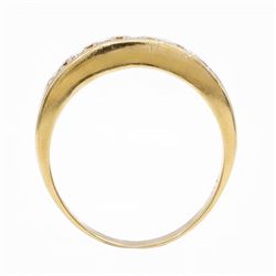 18ct gold diamond ring, channel set with seven round brilliant cut diamonds, hallmarked, total diamond weight 0.75 carat