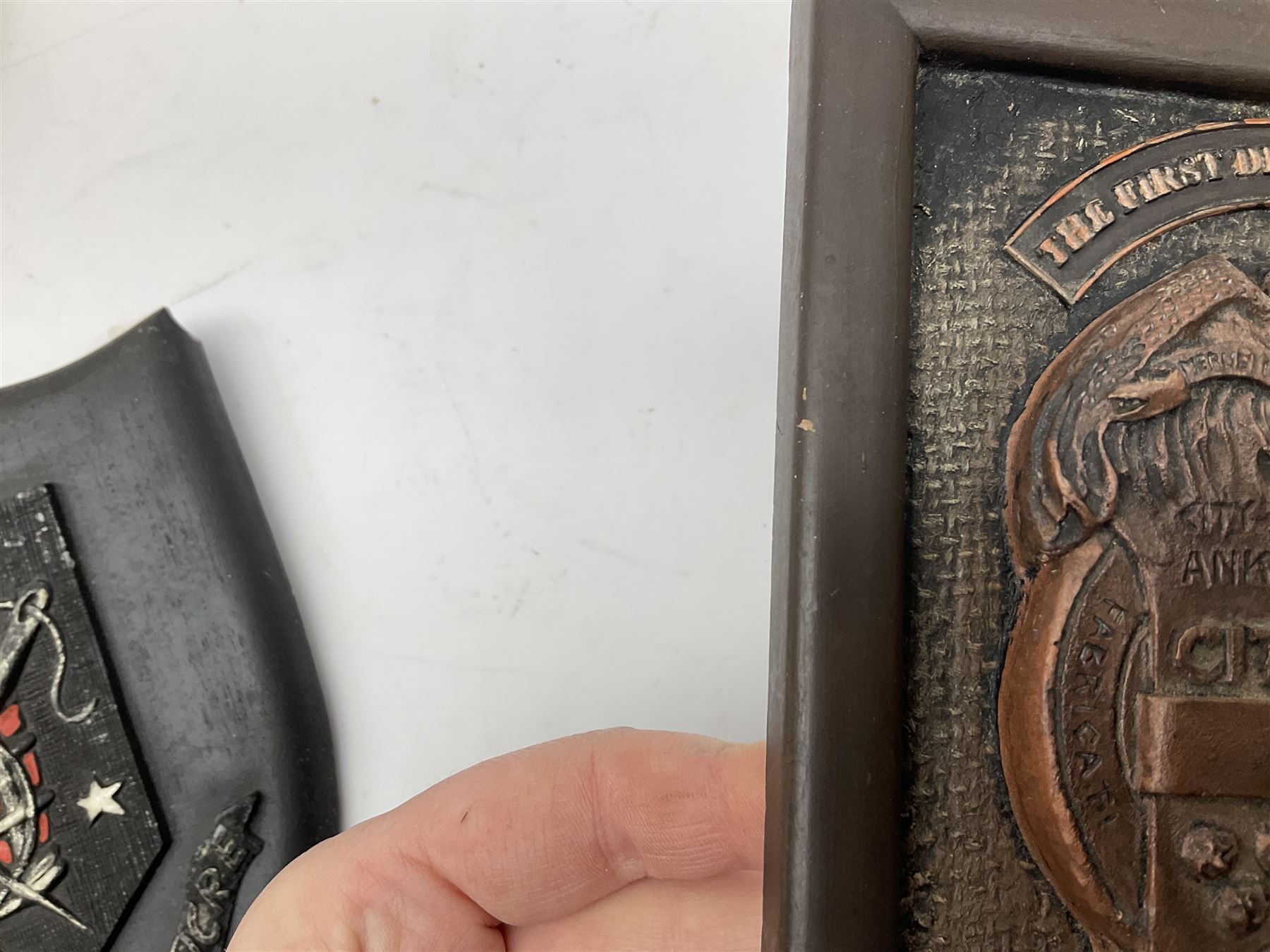 Terry Pratchett Discworld plaques, designed by Clarecraft, comprising 'the First Discworld Event Clarecraft August 95', the collectors guild joining shield, the fools guild DW99C, the seamstresses guild DW98C, the musicians guild DW00C together with 'Door of the mended drum' wall hanging DW17. 