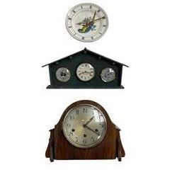 Three mantle clocks including a Westminster chiming clock, slate cased clock with barometer and hygrometer and a china plate clock with quartz movement