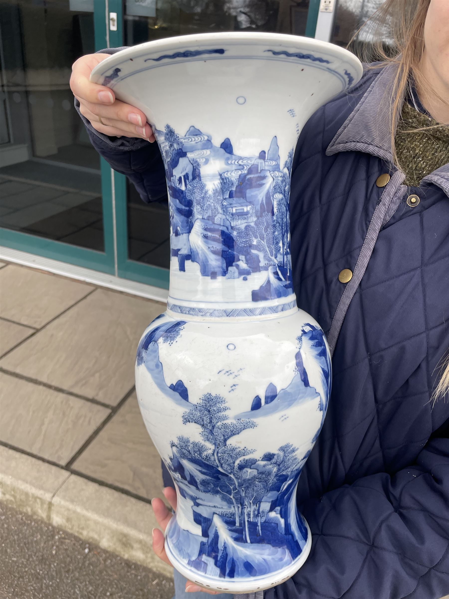Qing Dynasty Yen Yen blue and white vase in the Kangxi style decorated with a lake landscape surrounded by rocky cliffs, figures in a boat and on the shore H45cm 