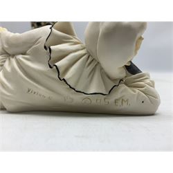 Pair of early-mid 20th century figural composite bookends modelled as harlequin court jesters sat upon stacks of books, H20cm together with a figure of a jester signed Vivian C (3)