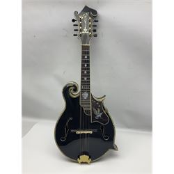 Eastern F-hole eight-string mandolin with black finish and mother-of-pearl inlay of a man riding a winged horse/unicorn amongst clouds and stars with playing card suits to the fingerboard L71cm