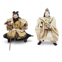 Two early 20th century Japanese 'Musha-ningyo' or Warrior Doll figures, costumed with dist...