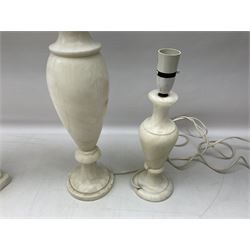 Four white hardstone table lamps with marble effect, two of classical urn form and two of column form,  tallest example H48cm
